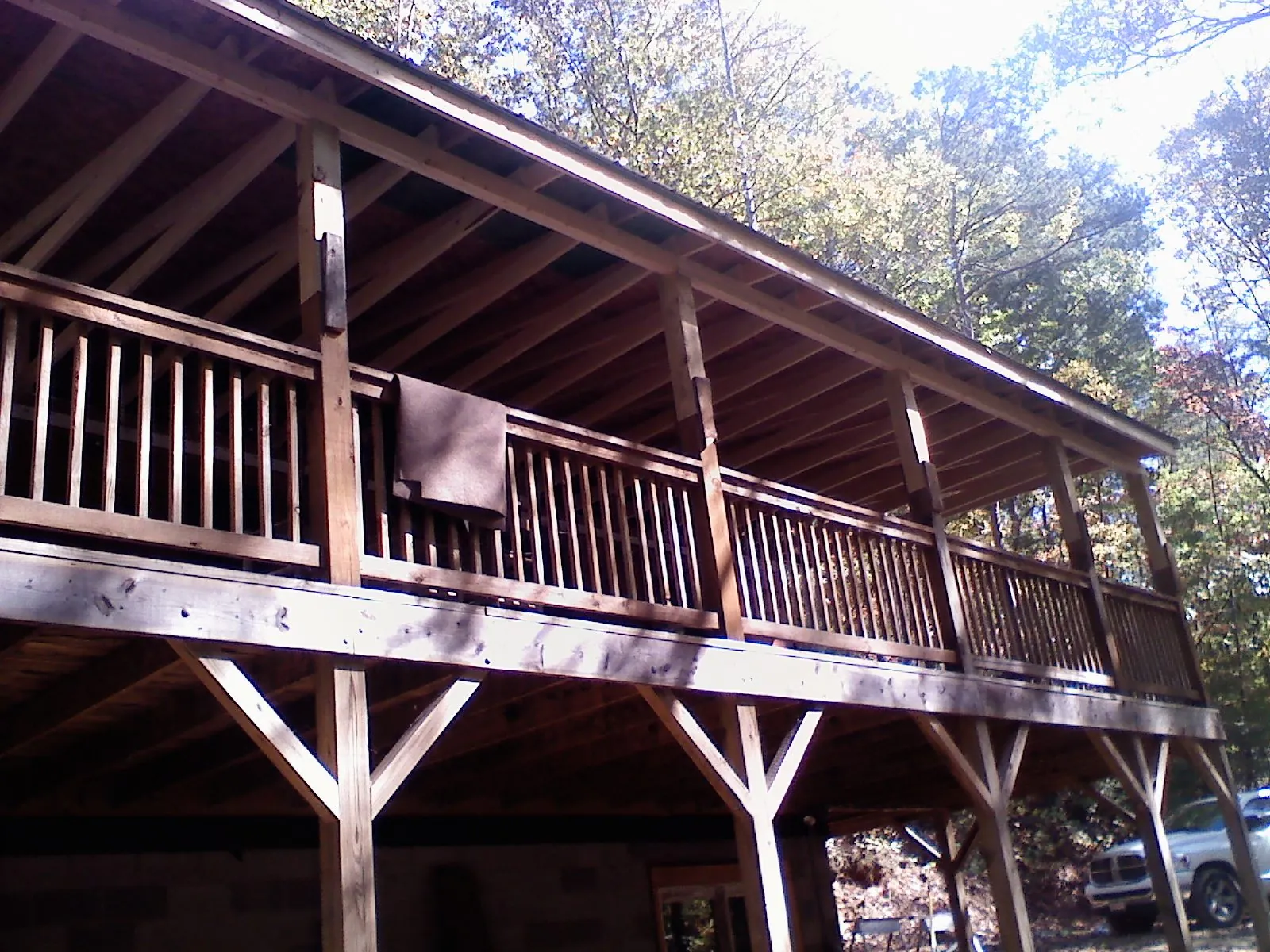 Timber framing under a new elevated porch and deck — Roof Leak Repair in Stewartville by Roofing Brothers
